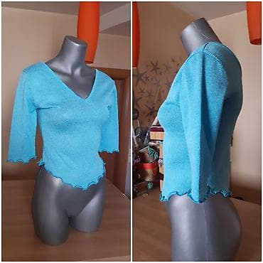 Plava ženska majica sa V-izrezom i 3/4 rukavima. Talasasti rub na na lalafo.rs — 2 Plava ženska majica sa V-izrezom i 3/4 rukavima. Talasasti rub na — 2