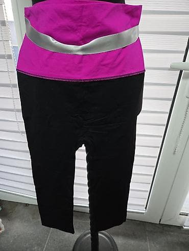 Ženske sportske helanke sa visokim pojasom. Donji deo je crn, dok je na lalafo.rs Ženske sportske helanke sa visokim pojasom. Donji deo je crn, dok je