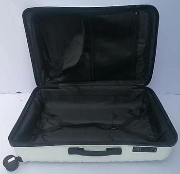 Travel suitcases and bags: === PART 1: TEXTUAL DESCRIPTION === Set od tri bela kofera sa tvrdim at lalafo.rs — 9 Travel suitcases and bags: === PART 1: TEXTUAL DESCRIPTION === Set od tri bela kofera sa tvrdim — 9