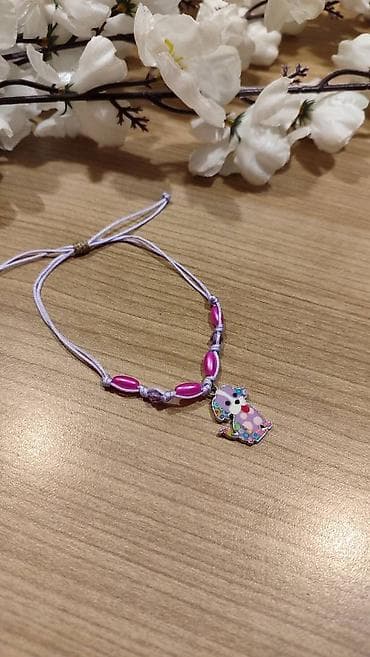 Narukvica sa priveškom – ljubičasta - Ručno pletena narukvica od na lalafo.rs — 2 Narukvica sa priveškom – ljubičasta - Ručno pletena narukvica od — 2