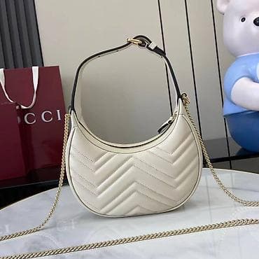 Torbica – krem bela hobo/saddle forma sa zlatnim detaljima - na lalafo.rs — 6 Torbica – krem bela hobo/saddle forma sa zlatnim detaljima - — 6