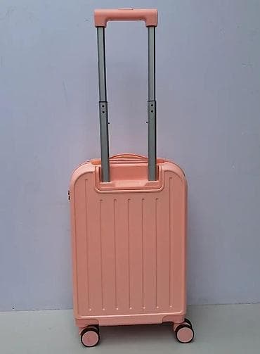 Travel suitcases and bags: Kofer na točkićima – ružičasta/losos nijansa, kabinski format - Tvrda at lalafo.rs — 7 Travel suitcases and bags: Kofer na točkićima – ružičasta/losos nijansa, kabinski format - Tvrda — 7