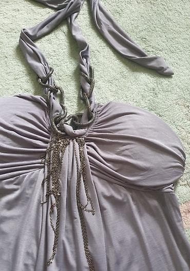 Haljina letnja s-m, sive boje. Free size je. Ima ogrlicu oko vrata od na lalafo.rs Haljina letnja s-m, sive boje. Free size je. Ima ogrlicu oko vrata od