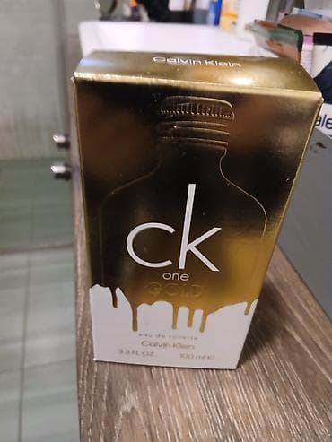 Calvin Klein CK One Gold – eau de toilette, unisex, 100 ml (3.3 fl na lalafo.rs — 10 Calvin Klein CK One Gold – eau de toilette, unisex, 100 ml (3.3 fl — 10