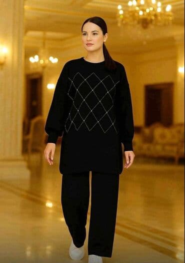 Dvoset ženske odeće – crni pleteni komplet - Gornji deo: duža pletena na lalafo.rs Dvoset ženske odeće – crni pleteni komplet - Gornji deo: duža pletena