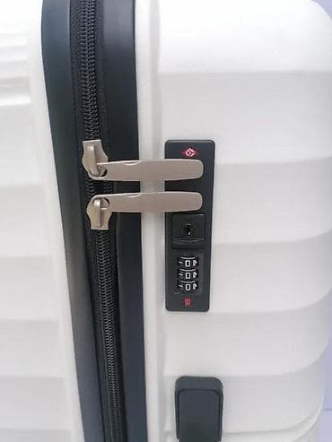 Travel suitcases and bags: === PART 1: TEXTUAL DESCRIPTION === Set od tri bela kofera sa tvrdim at lalafo.rs — 7 Travel suitcases and bags: === PART 1: TEXTUAL DESCRIPTION === Set od tri bela kofera sa tvrdim — 7