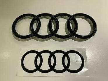 Transport: Prednji znak Audi 27,5 x 9,5cm - crni sjaj. Zamenski znakovi Audi at lalafo.rs — 1 Transport: Prednji znak Audi 27,5 x 9,5cm - crni sjaj. Zamenski znakovi Audi — 1