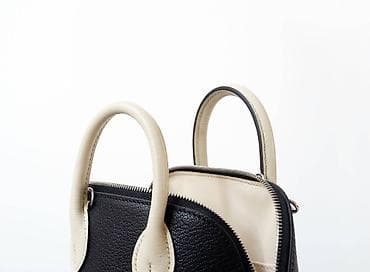 Elegantna torba – crno‑bela, kožna, mini bowling/satchel stil. - at lalafo.rs — 2 Elegantna torba – crno‑bela, kožna, mini bowling/satchel stil. - — 2