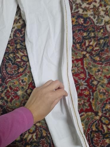 Belo platneno donje delo sa elastičnim pojasom. Ravne nogavice, duž na lalafo.rs — 1 Belo platneno donje delo sa elastičnim pojasom. Ravne nogavice, duž — 1