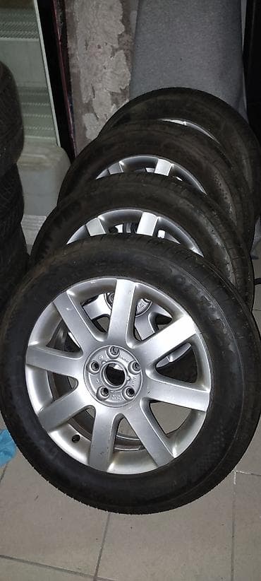 Komplet od 4 aluminijumske felne sa gumama za Volkswagen. - Model na lalafo.rs Komplet od 4 aluminijumske felne sa gumama za Volkswagen. - Model