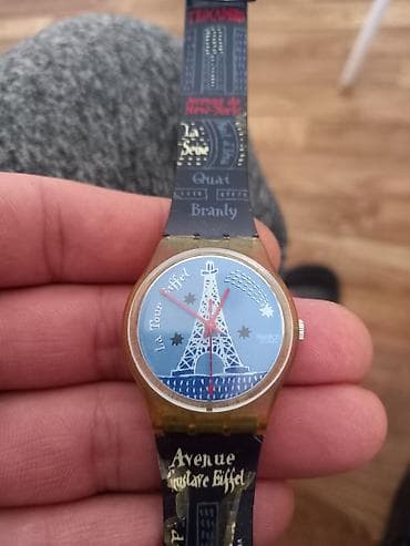 Swatch ručni sat – La Tour Eiffel motiv - Švajcarski kvarcni sat na lalafo.rs — 1 Swatch ručni sat – La Tour Eiffel motiv - Švajcarski kvarcni sat — 1