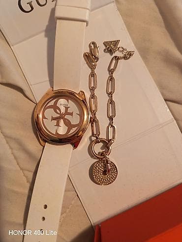 GUESS ženski set – sat i narukvica original - Modni sat sa velikim at lalafo.rs — 2 GUESS ženski set – sat i narukvica original - Modni sat sa velikim — 2