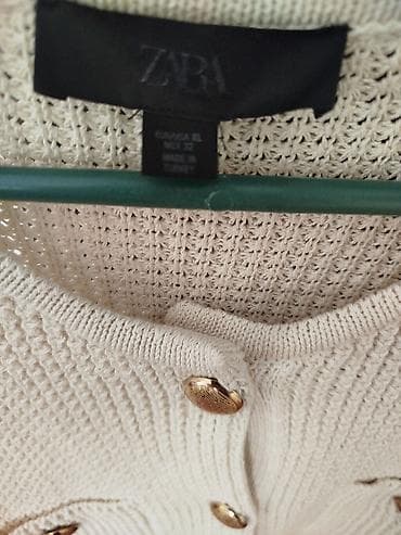 ZARA pleteni kardigan, krem/bež boje - Model: kardigan sa okruglim na lalafo.rs ZARA pleteni kardigan, krem/bež boje - Model: kardigan sa okruglim
