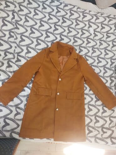 Kaputi: Novi kaput,nije nijednom obučen. Veličina m na lalafo.rs Kaputi: Novi kaput,nije nijednom obučen. Veličina m