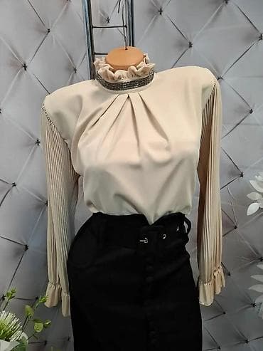 Elegantna ženska bluza sa visokim karner-okragnim okovratnikom na lalafo.rs Elegantna ženska bluza sa visokim karner-okragnim okovratnikom