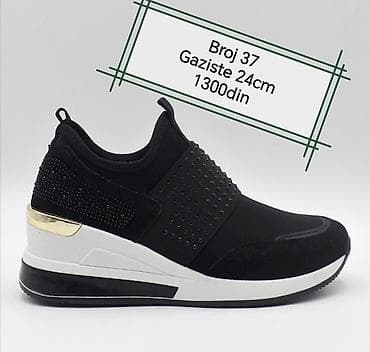 Ženske patike u crnoj boji sa platformom, kombinuju stil i udobnost na lalafo.rs Ženske patike u crnoj boji sa platformom, kombinuju stil i udobnost