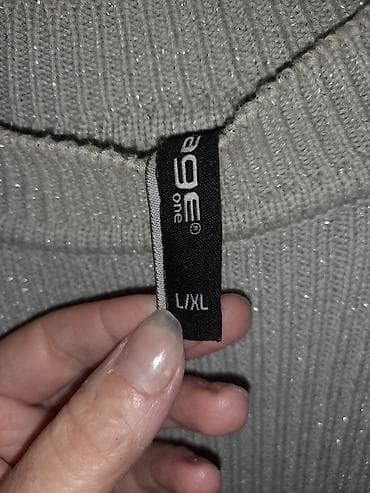 kom sa etiketom: Sivi pleteni džemper sa sjajnim nitima – brend age one, veličina L/XL at lalafo.rs — 1 kom sa etiketom: Sivi pleteni džemper sa sjajnim nitima – brend age one, veličina L/XL — 1