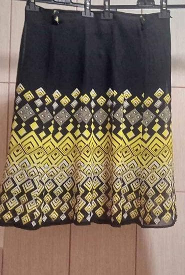 Suknja, br.44, ima postavu i rajfeslus sa strane na lalafo.rs — 1 Suknja, br.44, ima postavu i rajfeslus sa strane — 1