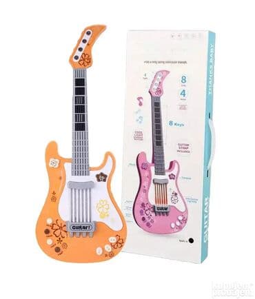 Muzički instrumenti za decu: Muzicka gitara koja svetli i svira. muzicka gitara koja svetli i svira na lalafo.rs — 1 Muzički instrumenti za decu: Muzicka gitara koja svetli i svira. muzicka gitara koja svetli i svira — 1