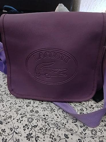 Lacoste torbica preko ramena – ljubičasta - Model sa preklopom i na lalafo.rs Lacoste torbica preko ramena – ljubičasta - Model sa preklopom i