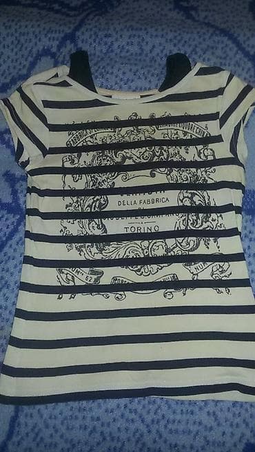 Na prodaju lepa crno bela majica na pruge, sa bretelama da se malo na lalafo.rs Na prodaju lepa crno bela majica na pruge, sa bretelama da se malo