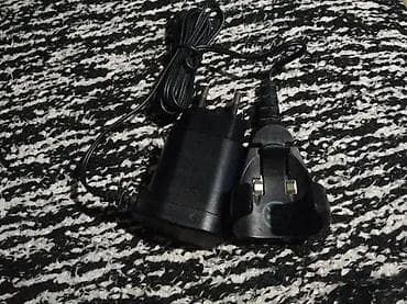 1. Remington PA-0510E 2. Charger Kemei Ac Dc Adaptor Model na lalafo.rs — 6 1. Remington PA-0510E 2. Charger Kemei Ac Dc Adaptor Model — 6