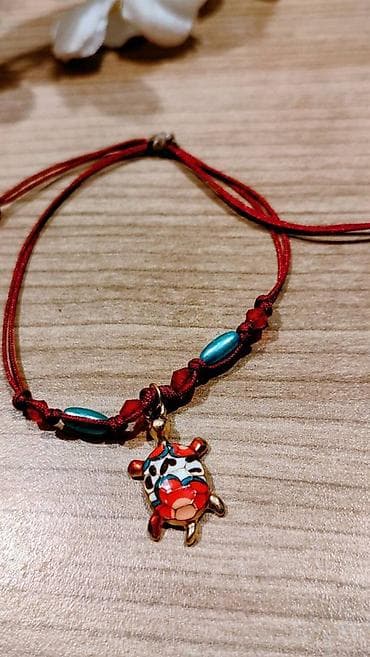 Naručiva narukvica sa privjeskom kornjače - Ručno pletena narukvica na lalafo.rs — 1 Naručiva narukvica sa privjeskom kornjače - Ručno pletena narukvica — 1