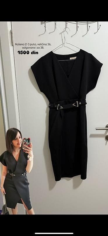 Elegantna crna haljina sa V-izrezom i kratkim rukavima. Kroj olovka na lalafo.rs Elegantna crna haljina sa V-izrezom i kratkim rukavima. Kroj olovka