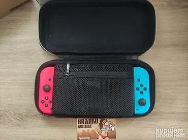 Torbica BigBen Game Traveler &Cartridge Cases - Switch Logo na lalafo.rs — 2 Torbica BigBen Game Traveler &Cartridge Cases - Switch Logo — 2