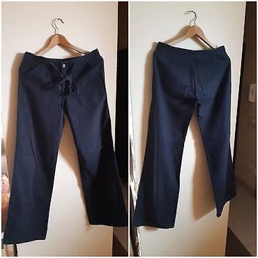 Crne pantalone sa širokom nogavicom i vezivanjem u struku. Prednji deo na lalafo.rs — 2 Crne pantalone sa širokom nogavicom i vezivanjem u struku. Prednji deo — 2