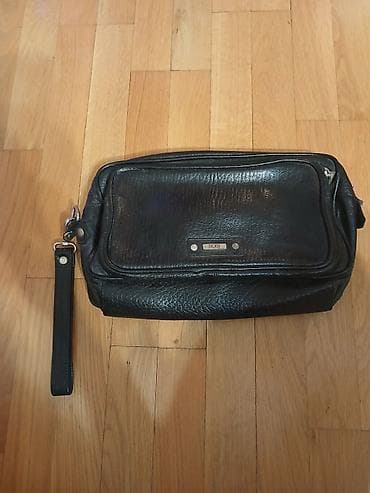 Muška kožna torbica/neseser sa ručkom Mona za nošenje oko zgloba. - at lalafo.rs — 1 Muška kožna torbica/neseser sa ručkom Mona za nošenje oko zgloba. - — 1