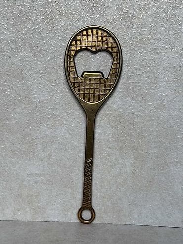 Vintage mesingani reket otvarač za flaše Autentičan mesingani otvarač na lalafo.rs Vintage mesingani reket otvarač za flaše Autentičan mesingani otvarač