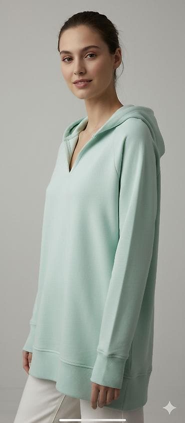 Ženska dukserica sa kapuljačom – pastelno mint zelena - Model: duži na lalafo.rs Ženska dukserica sa kapuljačom – pastelno mint zelena - Model: duži