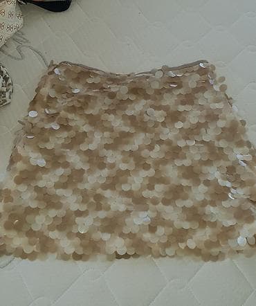 Suknjica bež/samapanajc boja,cela od plasticnih kruzica po sebi.Ima na lalafo.rs Suknjica bež/samapanajc boja,cela od plasticnih kruzica po sebi.Ima