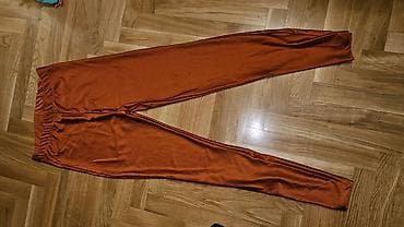 Helanke sjajne u narandžastoj nijansi. Veličina S-M-L rastegljive na lalafo.rs — 1 Helanke sjajne u narandžastoj nijansi. Veličina S-M-L rastegljive — 1