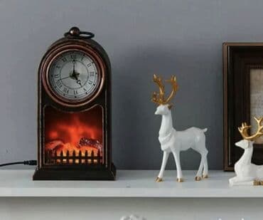 Sat sa LED svetlom imitacija plamena. Cena 3500 din. Retro dizajn. Led na lalafo.rs Sat sa LED svetlom imitacija plamena. Cena 3500 din. Retro dizajn. Led