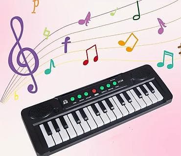 Преносиви електронски клавијатурски клавир са 31 тастером са USB na lalafo.rs Преносиви електронски клавијатурски клавир са 31 тастером са USB