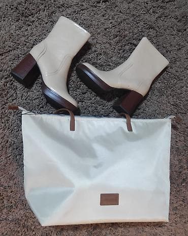 Komplet ženske modne obuće i torbe u bež nijansi. - Čizme do članka na lalafo.rs Komplet ženske modne obuće i torbe u bež nijansi. - Čizme do članka