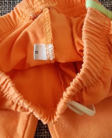 Dečje letnje pantalone 3/4 dužine, narandžaste boje sa svetlozelenim na lalafo.rs — 2 Dečje letnje pantalone 3/4 dužine, narandžaste boje sa svetlozelenim — 2