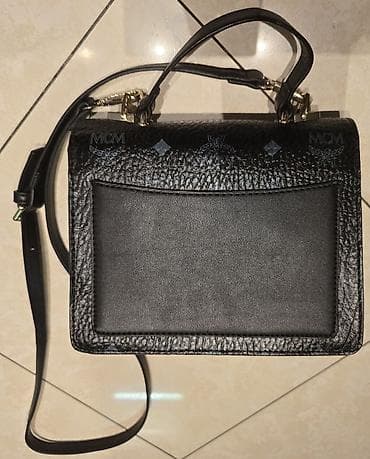 MCM torba preko ramena, ima dugačak kaiš. Na zlatnom vencu, u na lalafo.rs — 6 MCM torba preko ramena, ima dugačak kaiš. Na zlatnom vencu, u — 6