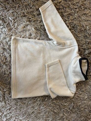 Bela dečja rolka/džemper od flisa - Materijal: 100% pamuk (prema na lalafo.rs Bela dečja rolka/džemper od flisa - Materijal: 100% pamuk (prema