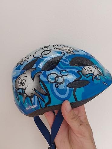 Oprema za bicikliste: Dečja biciklistička kaciga ABUS – motiv ajkule vel 45-50 obim - na lalafo.rs — 1 Oprema za bicikliste: Dečja biciklistička kaciga ABUS – motiv ajkule vel 45-50 obim - — 1