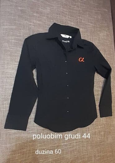 Crna košulja na dugmad sa dugim rukavima, klasičnog kragnog na lalafo.rs Crna košulja na dugmad sa dugim rukavima, klasičnog kragnog