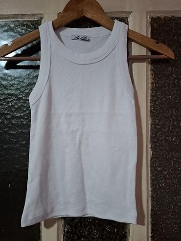 Bela ženska majca bez rukava (riblja kost), brenda Arslan, veličina S na lalafo.rs Bela ženska majca bez rukava (riblja kost), brenda Arslan, veličina S
