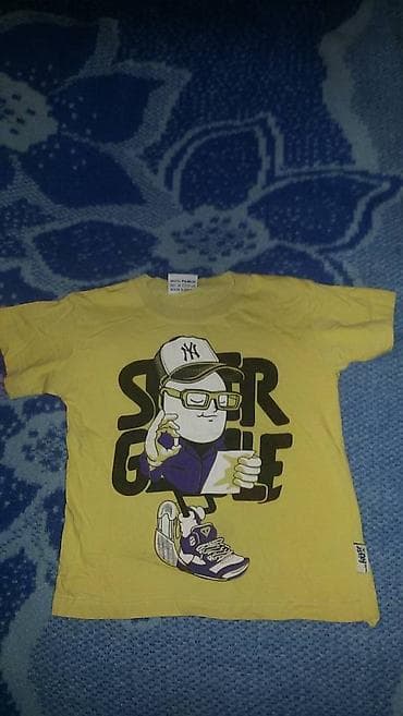 Na prodaju žuta majica kratkih rukava, za uzrast za 10ak godina, u na lalafo.rs Na prodaju žuta majica kratkih rukava, za uzrast za 10ak godina, u