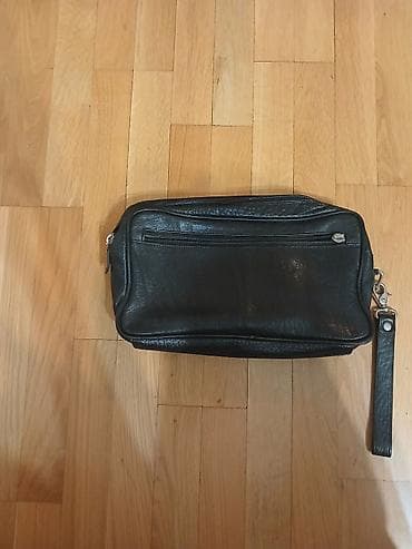 Muška kožna torbica/neseser sa ručkom Mona za nošenje oko zgloba. - at lalafo.rs — 2 Muška kožna torbica/neseser sa ručkom Mona za nošenje oko zgloba. - — 2