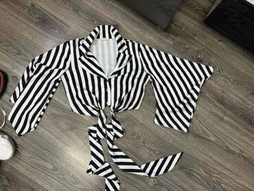 Košulja neobičnog kroja, veličine 38 na lalafo.rs Košulja neobičnog kroja, veličine 38