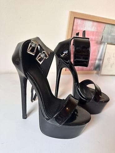 Crne sandale sa visokom štiklom i platformom, izrađene od materijala na lalafo.rs — 3 Crne sandale sa visokom štiklom i platformom, izrađene od materijala — 3