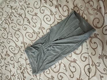 Siva suknja sa izrezom - Boja: siva melanž - Materijal: meki na lalafo.rs Siva suknja sa izrezom - Boja: siva melanž - Materijal: meki