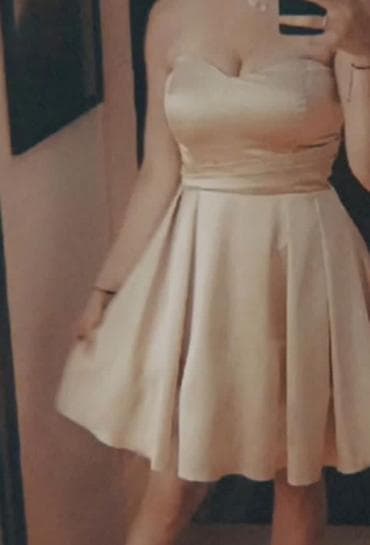 Elegantna koktel/večernja haljina u šampanj/bež nijansi. Nošena samo na lalafo.rs Elegantna koktel/večernja haljina u šampanj/bež nijansi. Nošena samo